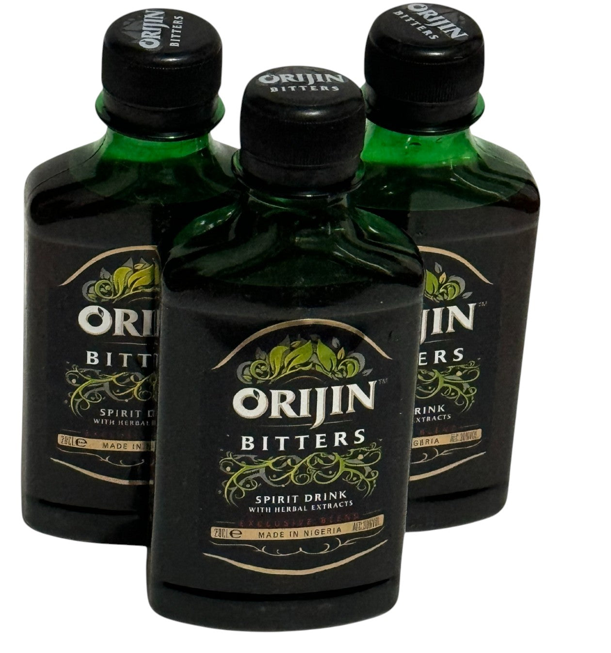 OASIS AFRICAN MARKET Orijin Bitters herbal spirit drink in dark green bottles with black caps, featuring a label with green leaf motifs and white text.